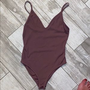 Mauve/purple body con